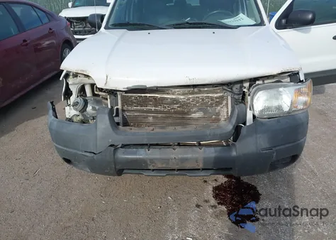 2004 Ford Escape Xls z USA, uszkodzony, nr VIN 1FMCU02124KB38345